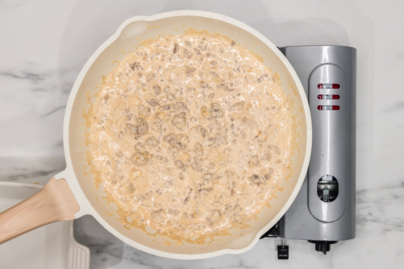 cheeseburger dip mixture in a skillet