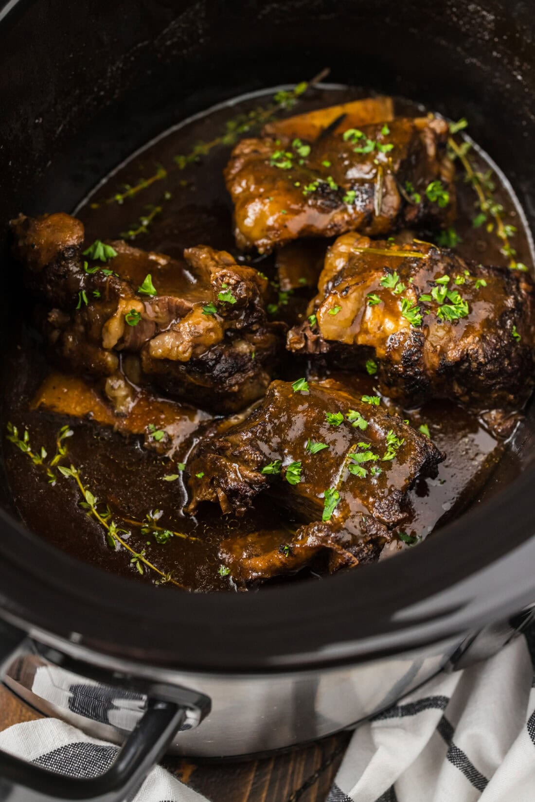 Close up photo of Crockpot Beef Short Ribs in a Crockpot