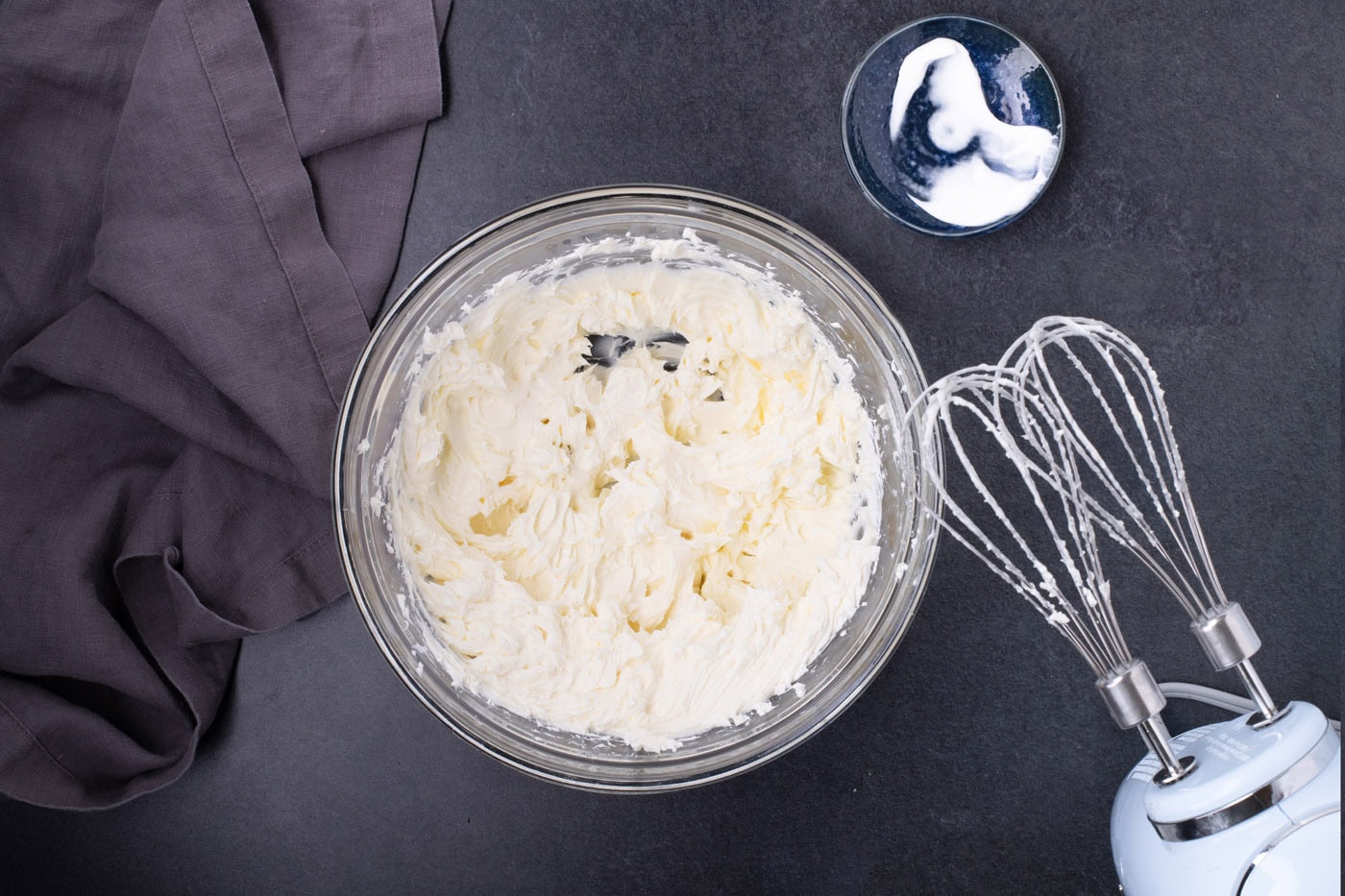 beaten cream cheese and sour cream in a bowl of a hand mixer