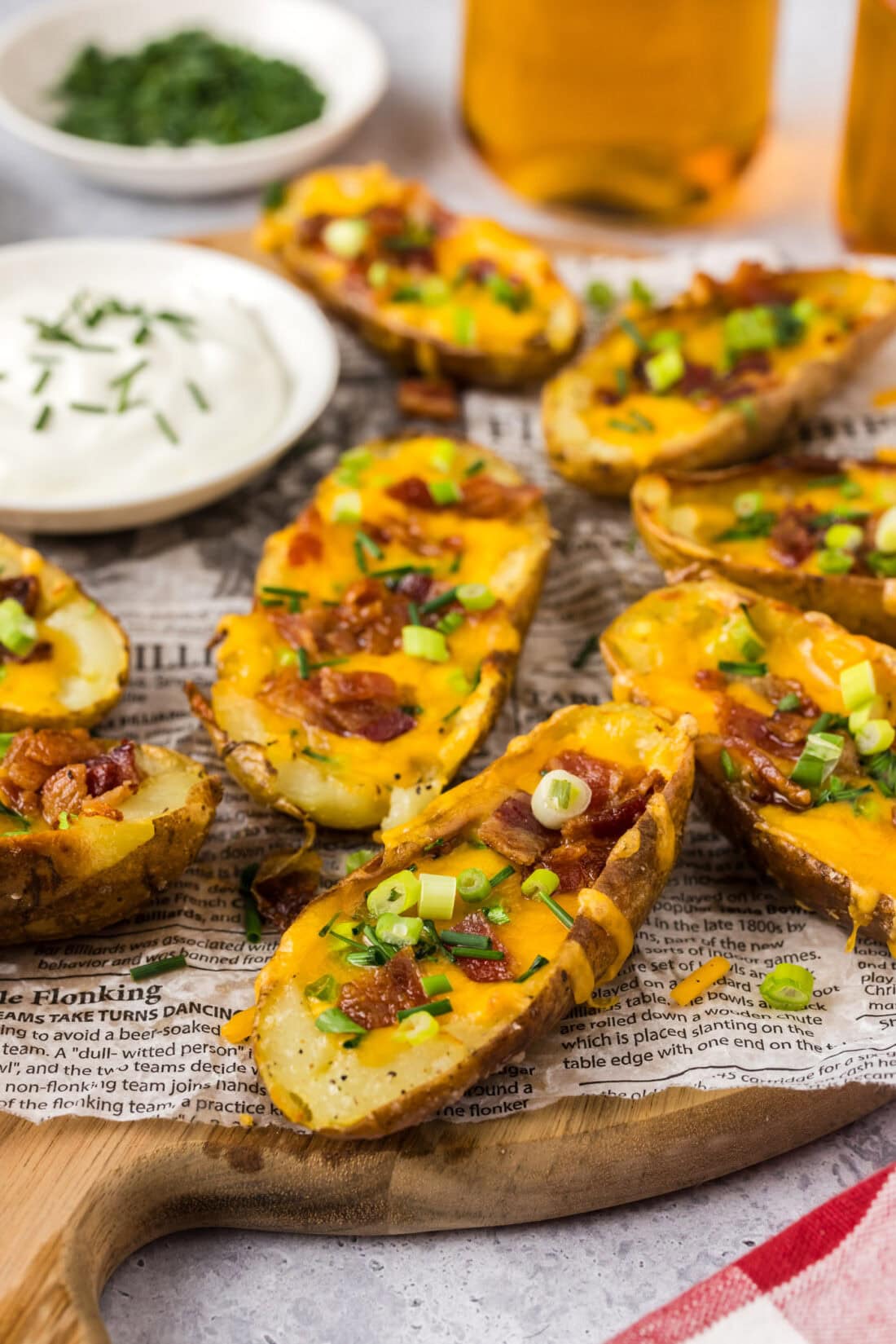 Close up photo of Potato Skins on a wooden platter