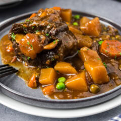 Slow Cooker Oxtail on a grey plate