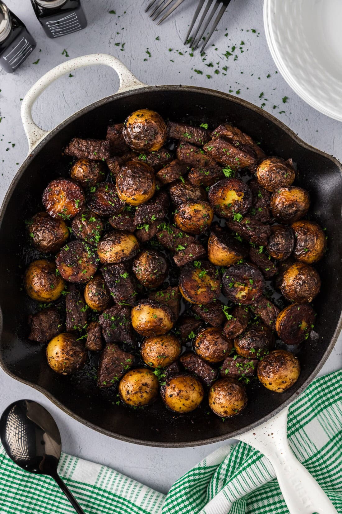 Close up photo of Steak and Potatoes in a skillet