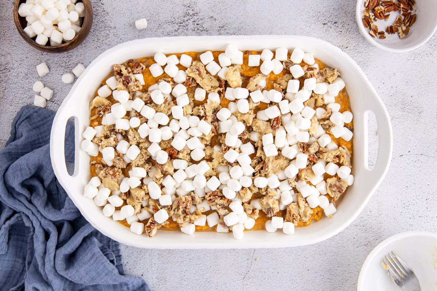 mini marshmallows layered over streusel topping and mashed sweet potatoes