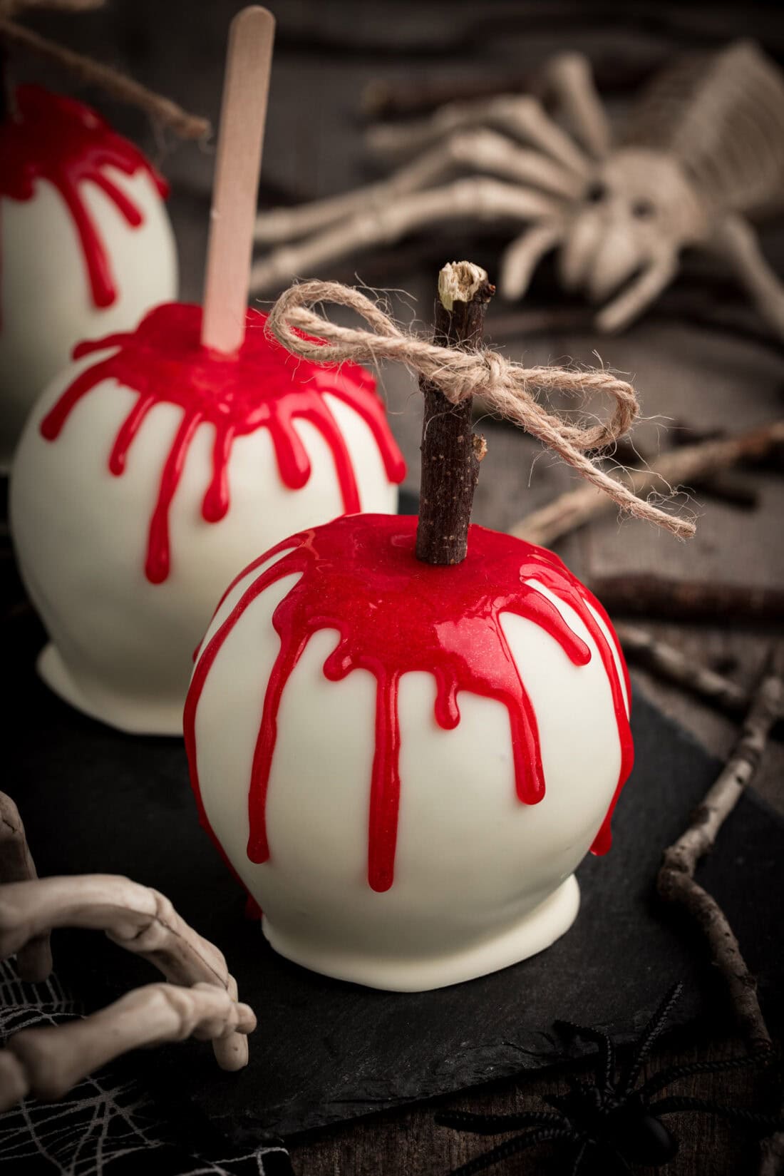 Three Bloody Candy Apples lined up in a row