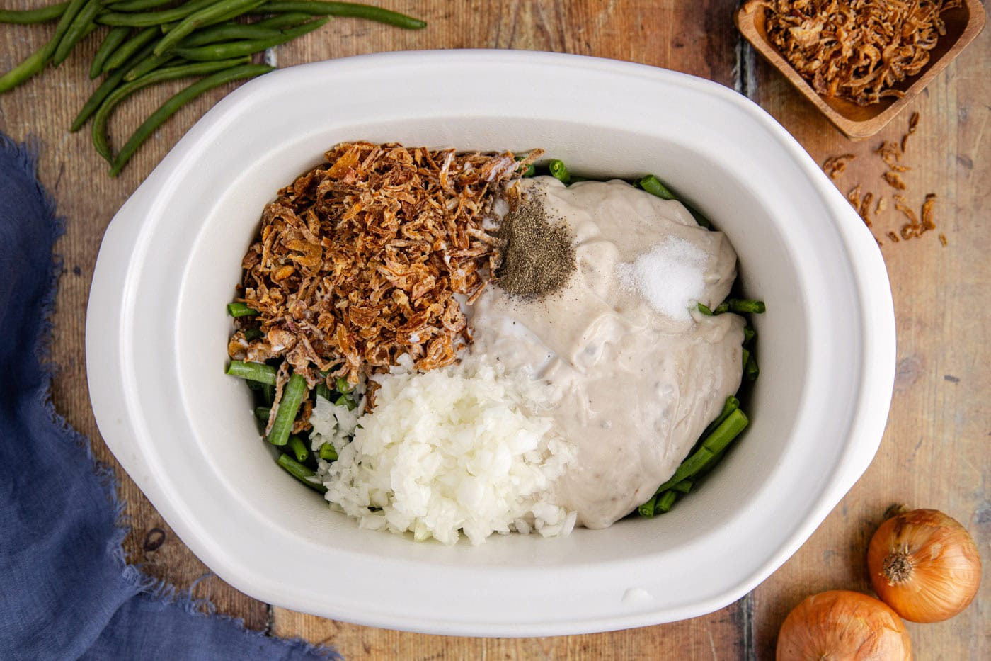 green bean casserole ingredients in a crockpot