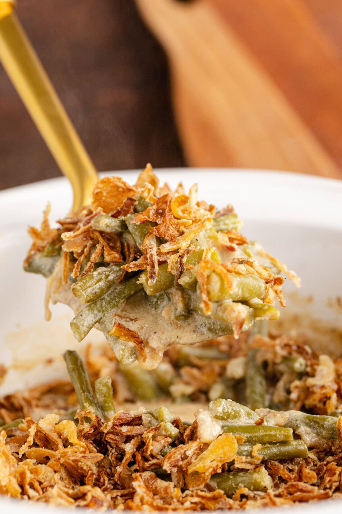 Close up photo of a spoonful of Crockpot Green Bean Casserole