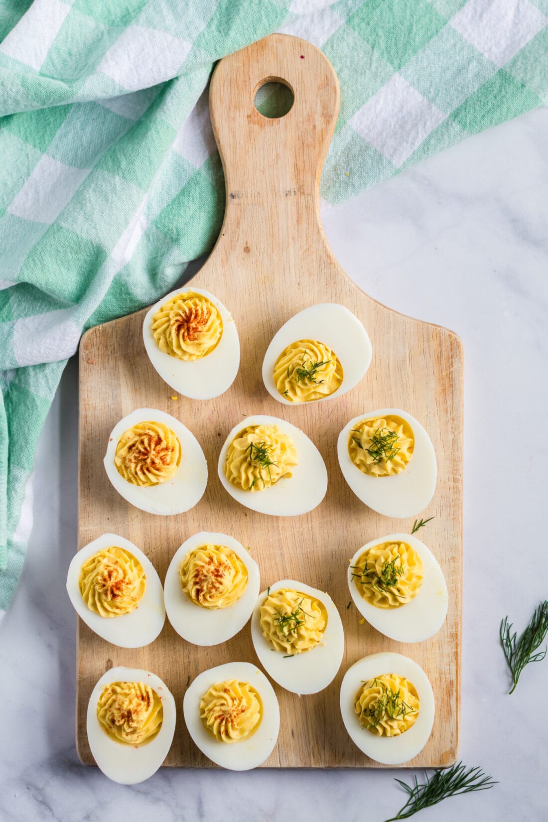 Overhead photo of Deviled Eggs on a wooden board