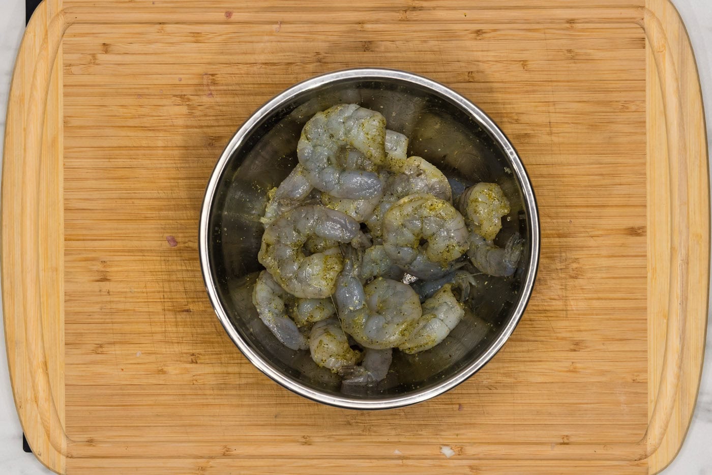 shrimp in a bowl with seasonings