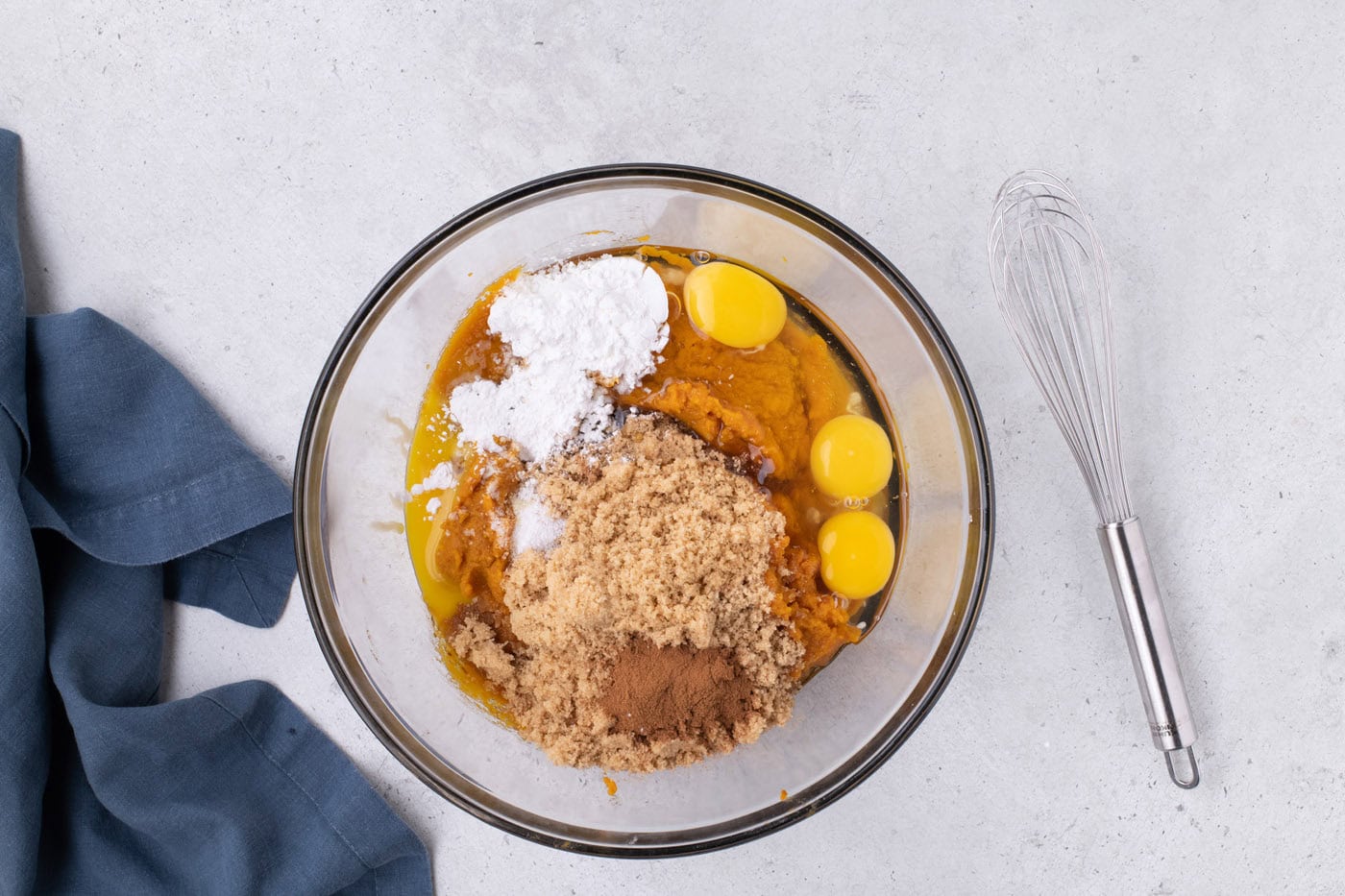 pumpkin puree, brown sugar, egg, egg yolk, cornstarch, and pumpkin pie spice in a bowl