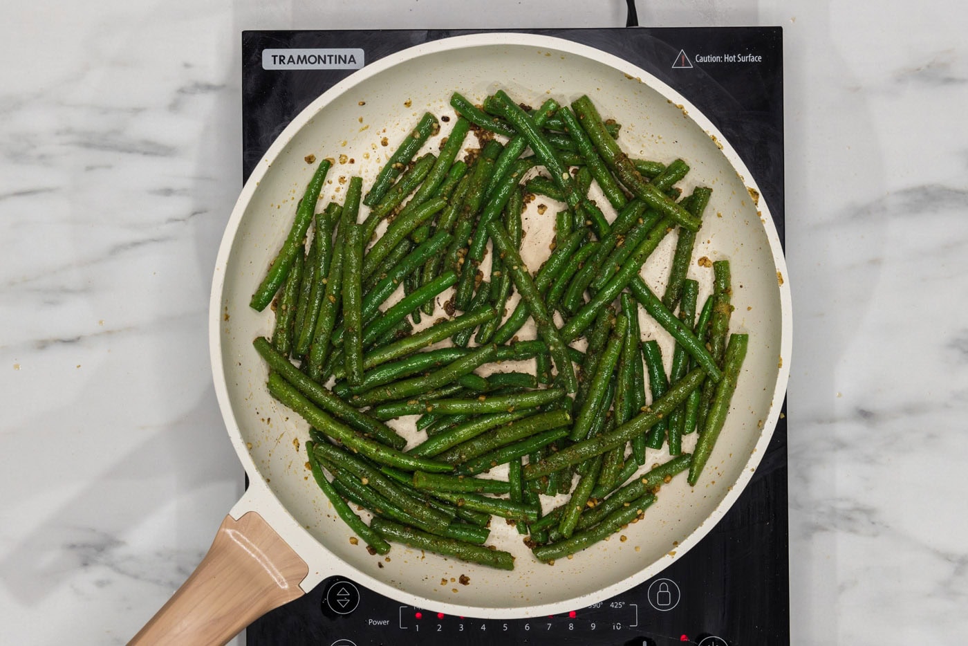 sauteed green beans in a skillet