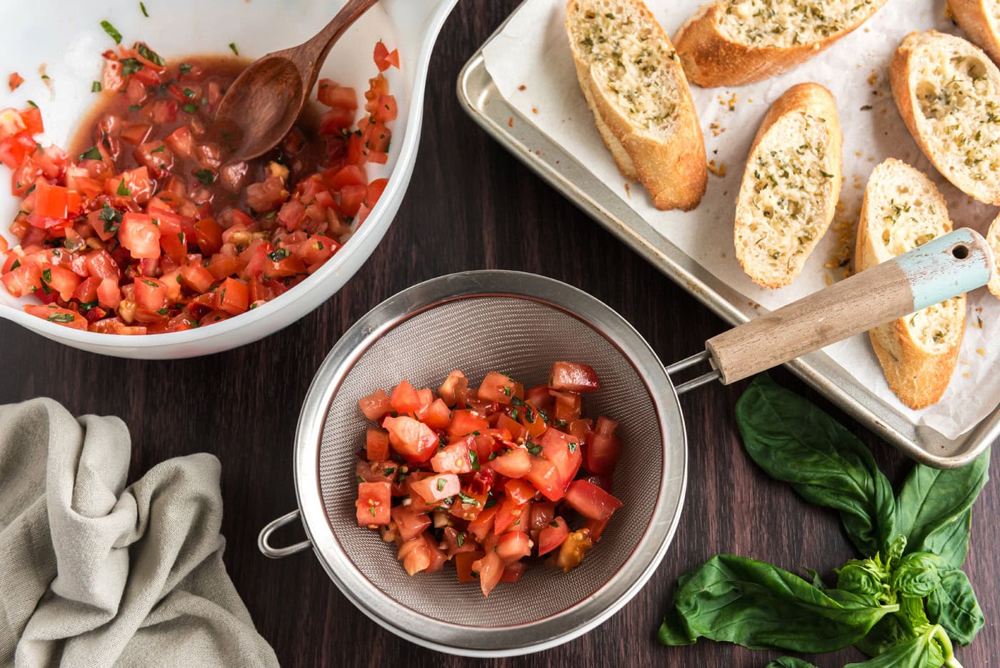 draining bruschetta tomato mixture