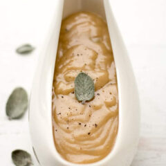 Close up photo of a gravy boat of Homemade Turkey Gravy