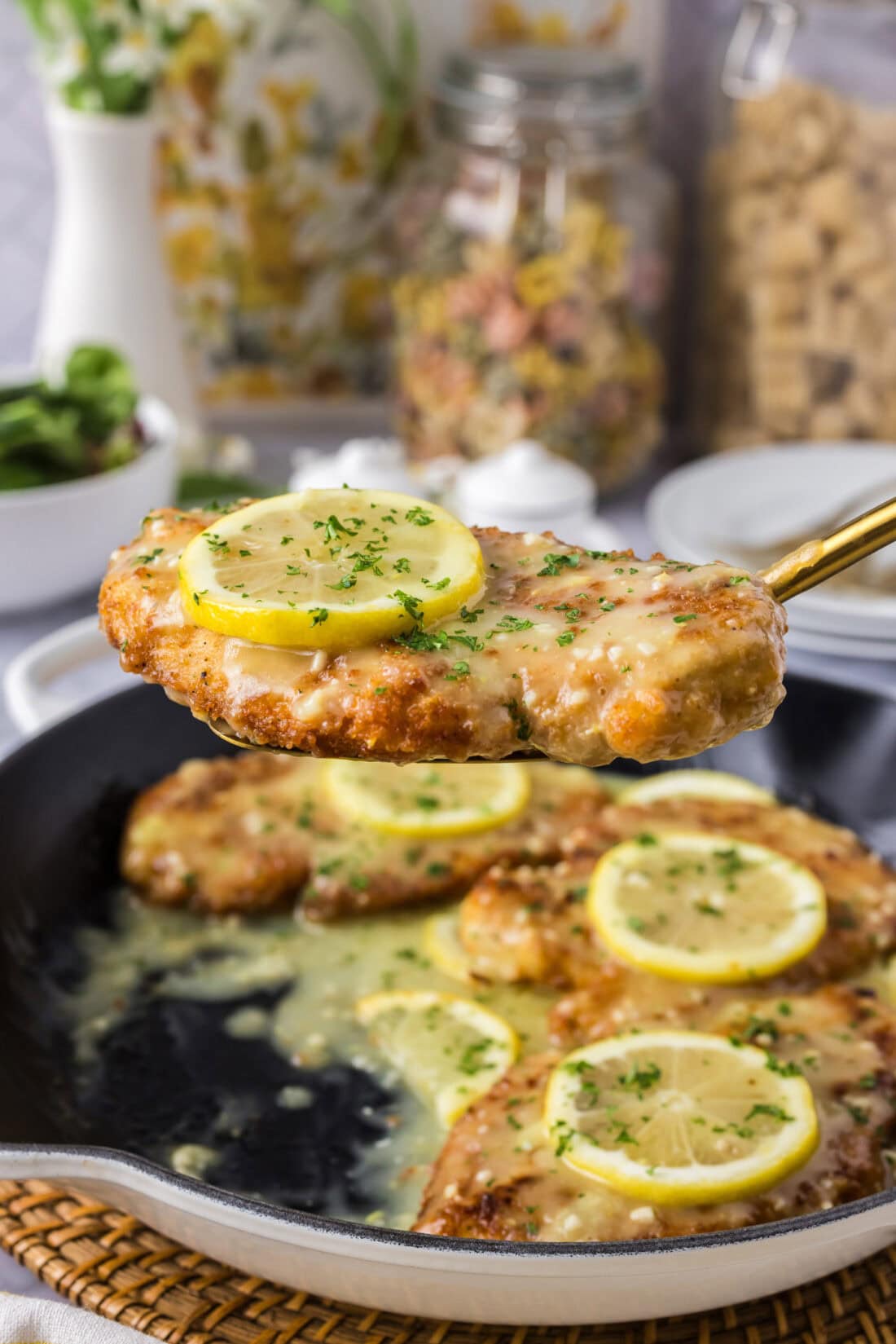 Spatula holding up Lemon Chicken