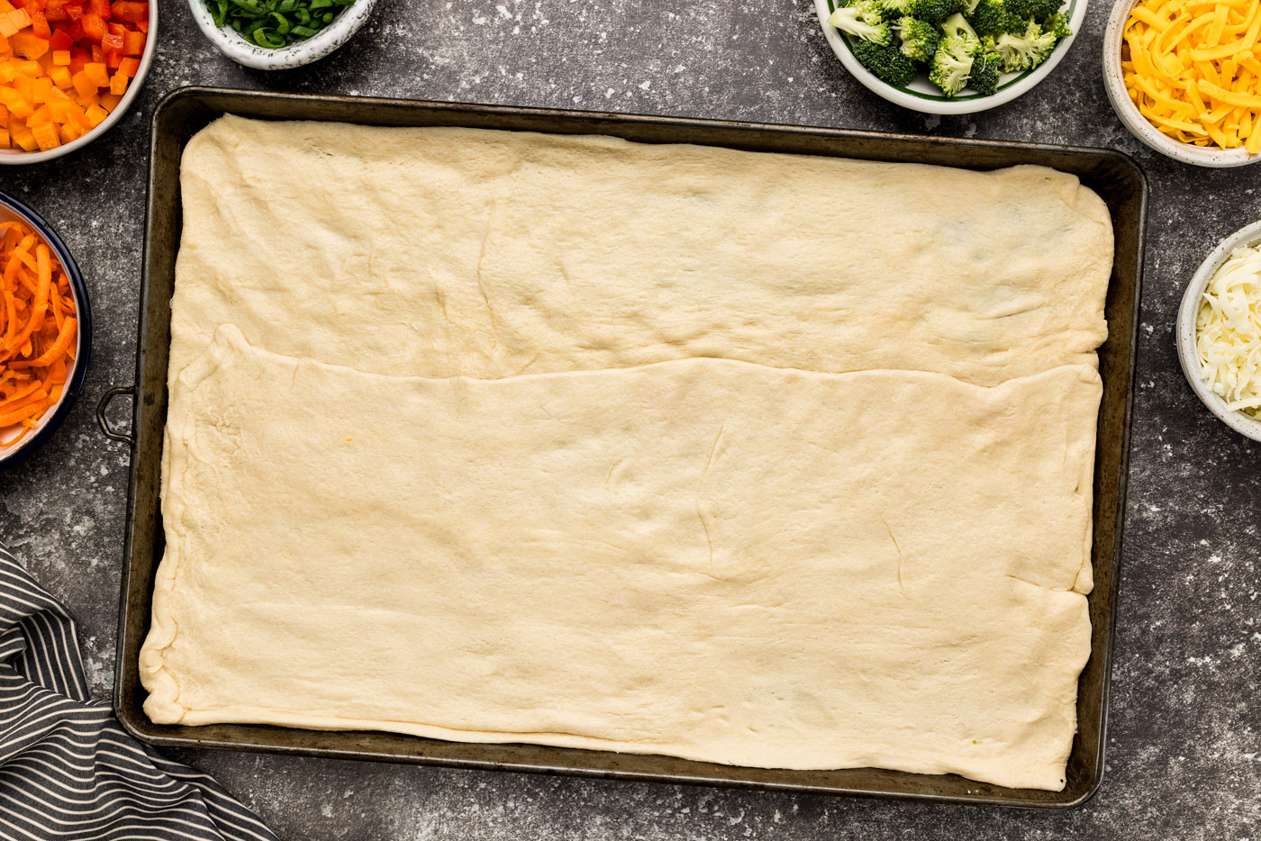 crescent dough sheets on a baking pan