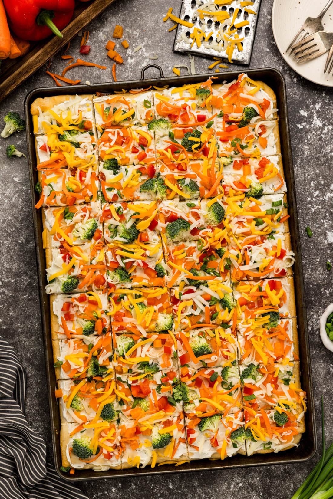 Appetizer Veggie Pizza in a pan cut into slices