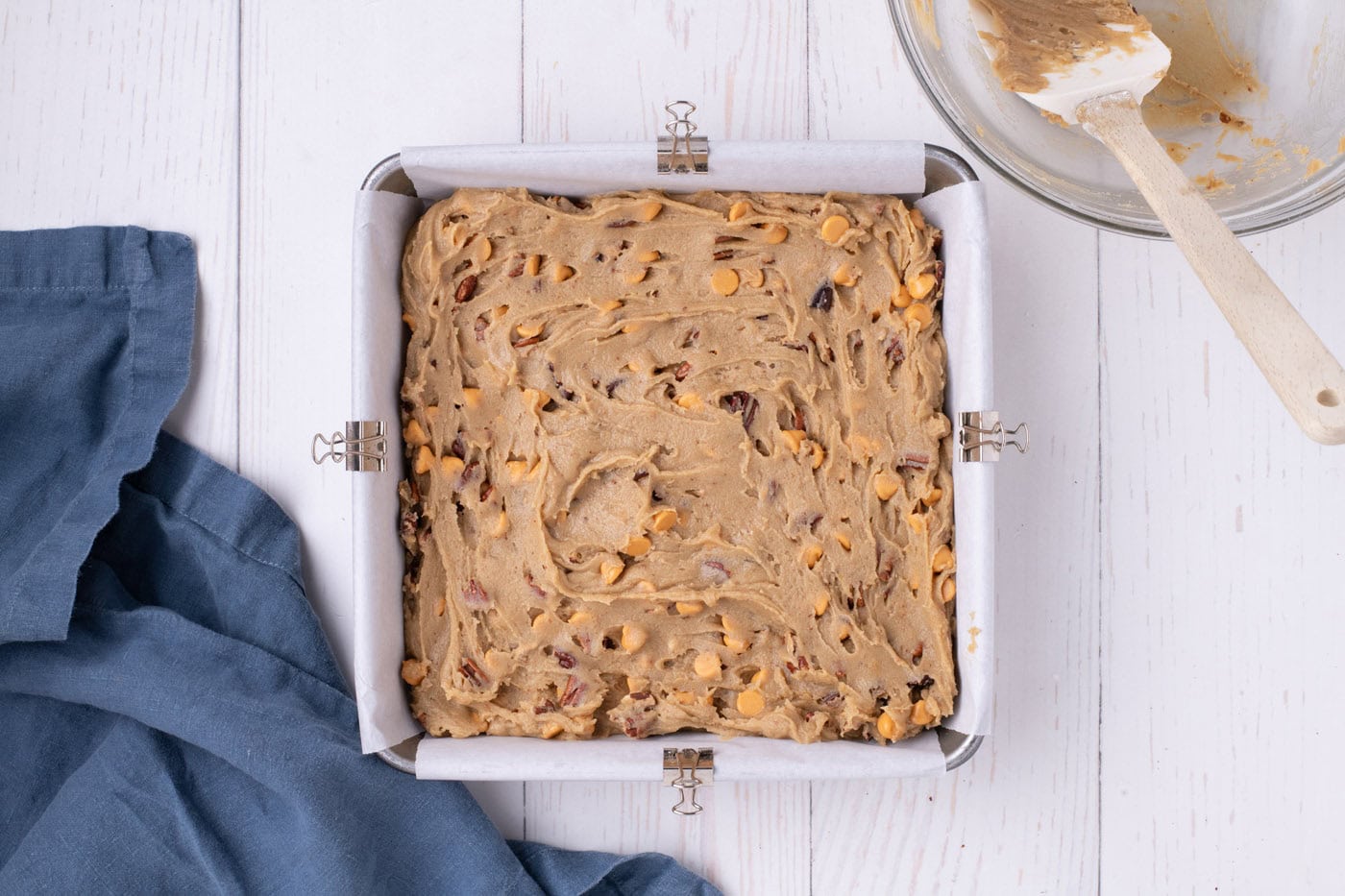 butterscotch brownie batter in a baking pan