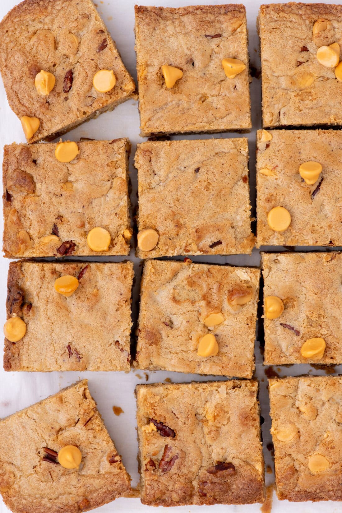 Butterscotch Brownies scatted on parchment paper