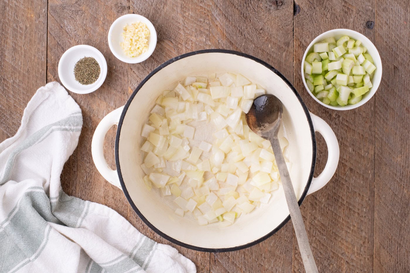 satueeing onions in a cast iron pot