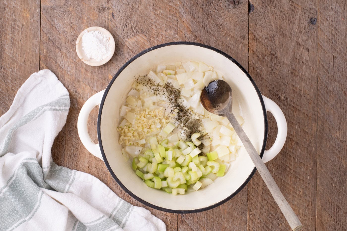 onions, celery, and garlic in a pot