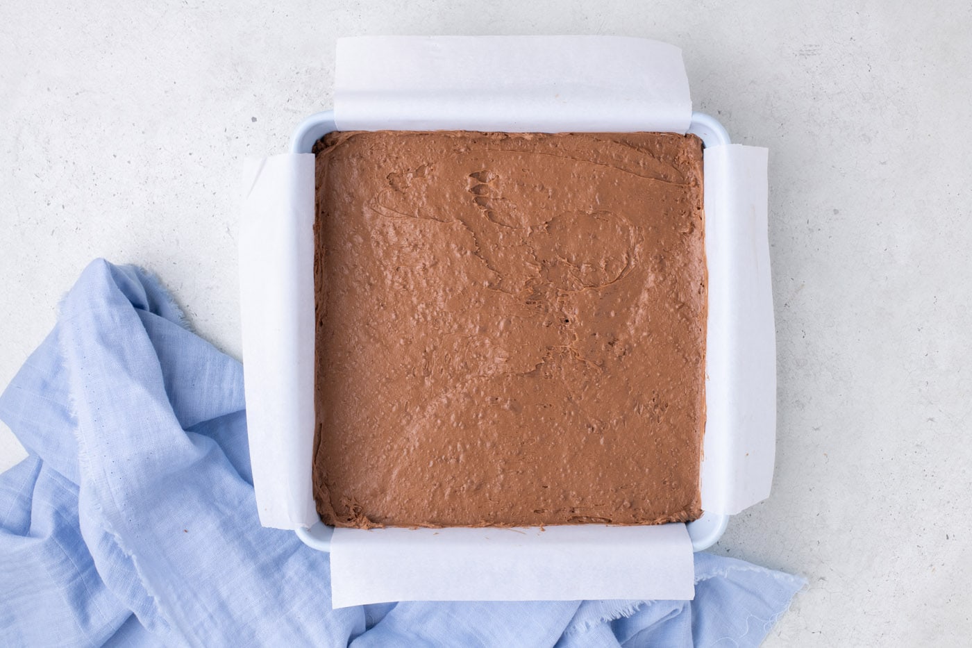 chilled whipped chocolate mixture in a baking pan