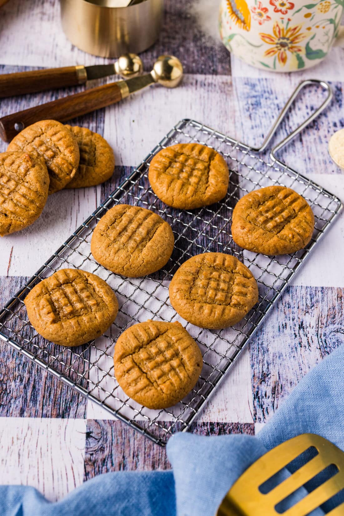 Keto Peanut Butter Cookies resting on a safety grater 