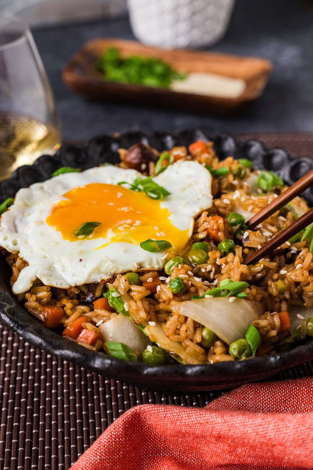 Bowl of Korean Fried Rice with chopsticks in it