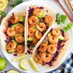 Close up photo of three Shrimp Tacos on a plate