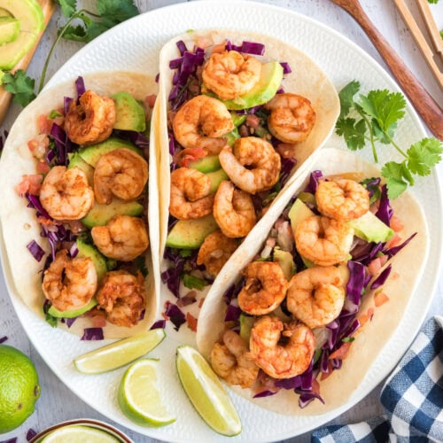 Close up photo of three Shrimp Tacos on a plate