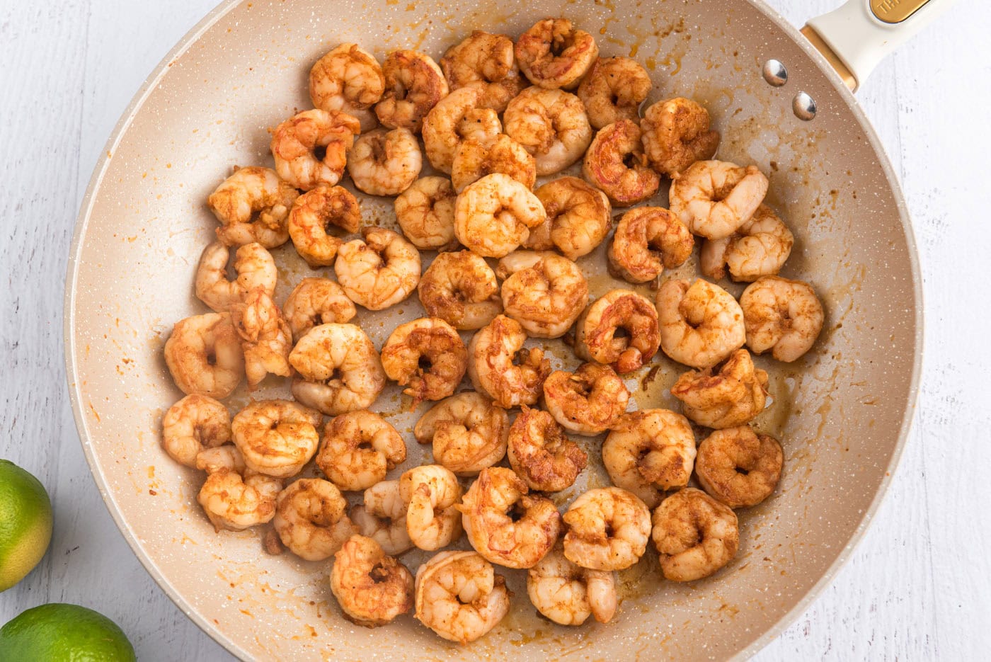 cooked seasoned shrimp in a skillet