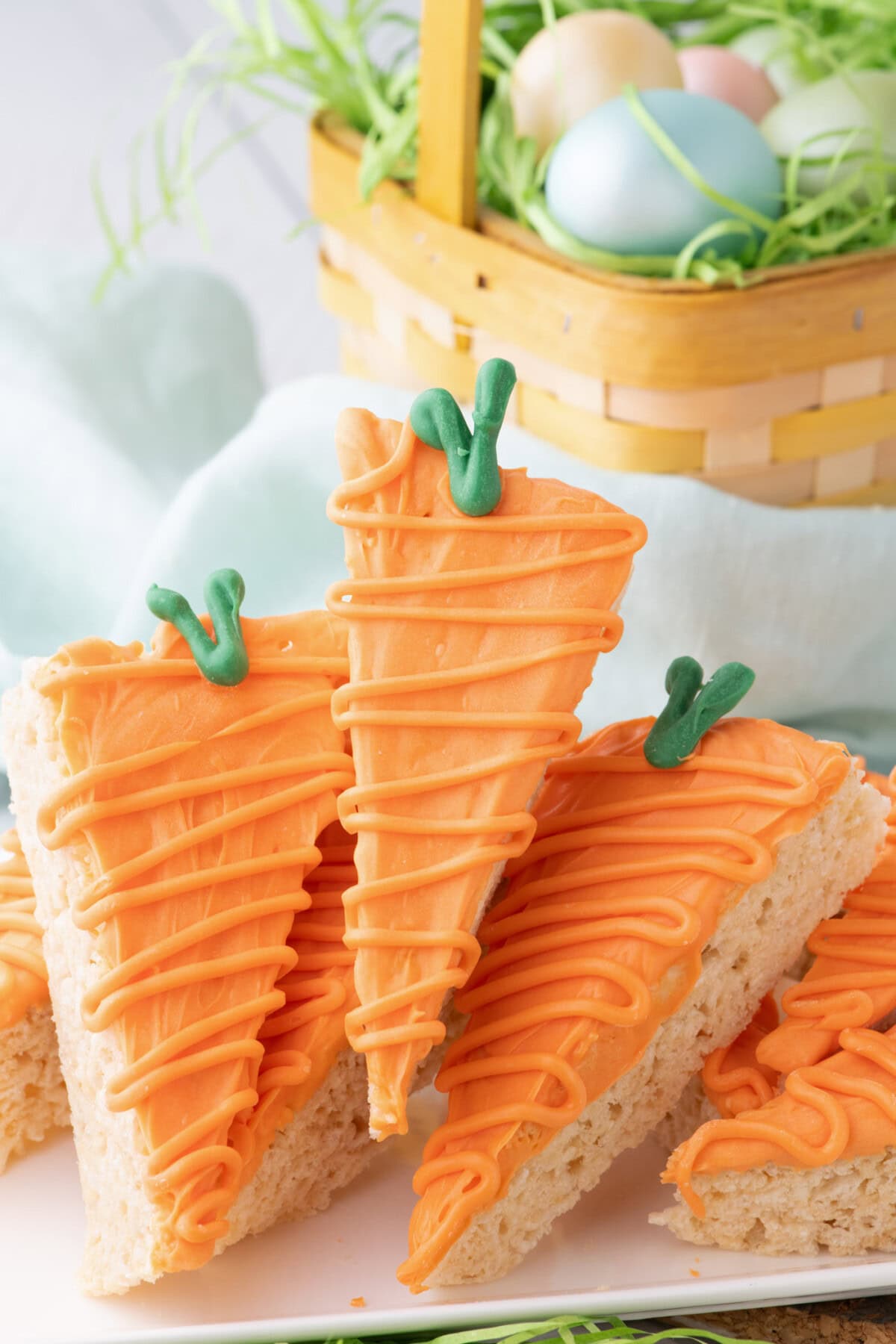 Carrot Rice Krispy Treats stacked on a platter