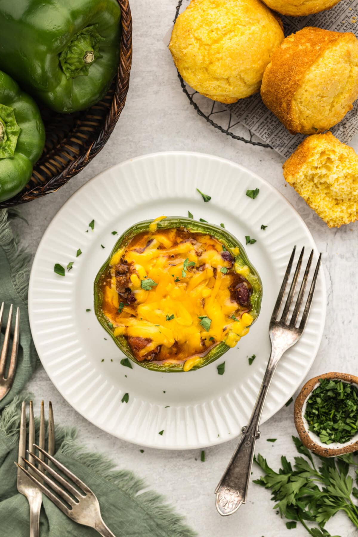 Oerhead photo of a Chili and Cornbread Stuffed Pepper on a plate