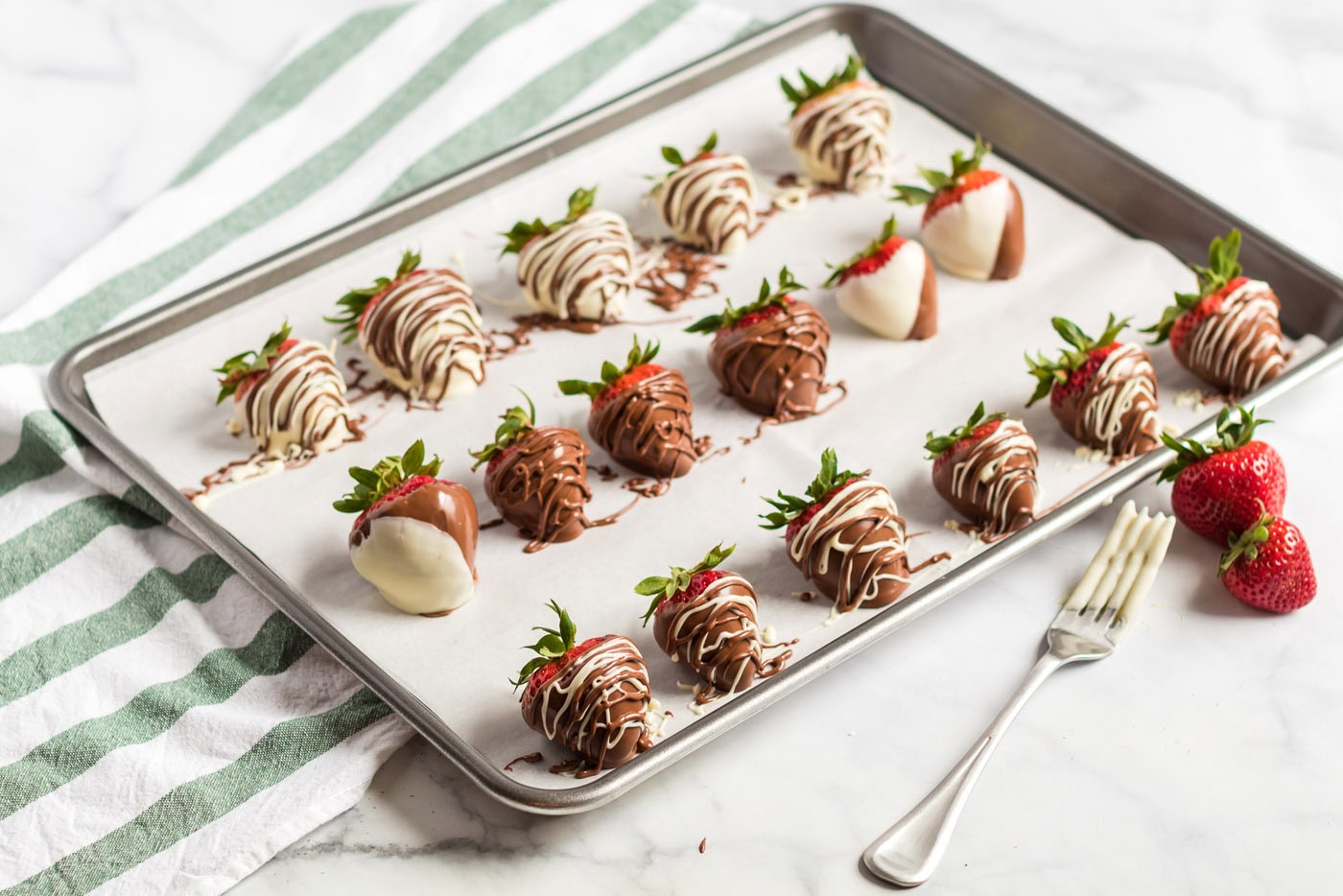 Chocolate Covered Strawberries on a parchment lined pan