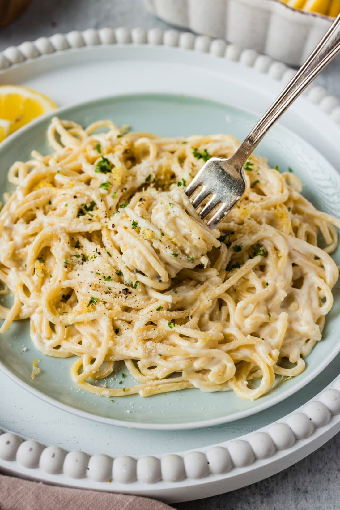 Pasta being twirled around a fork