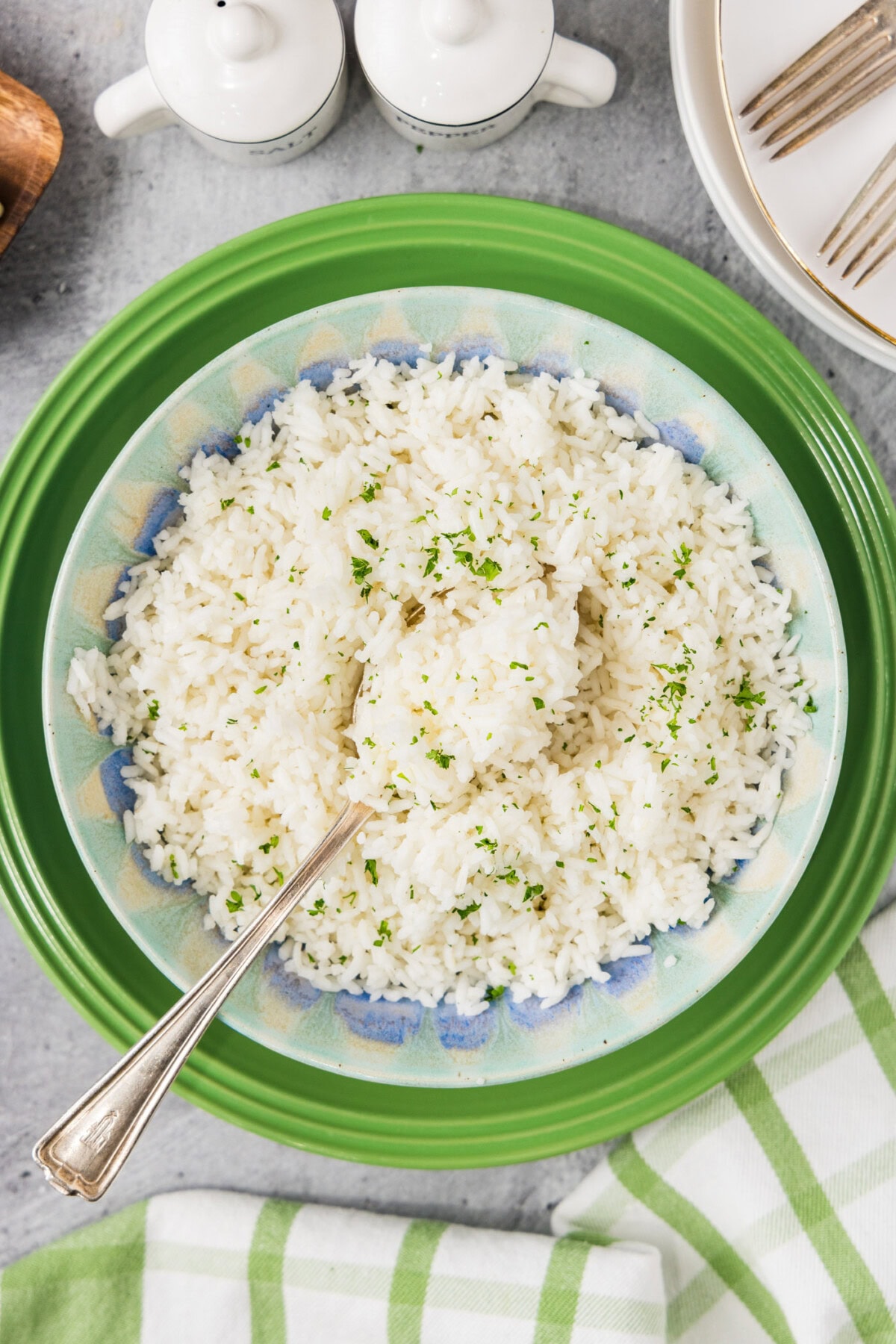 Plate of Pasta Method Rice with a spoon in it