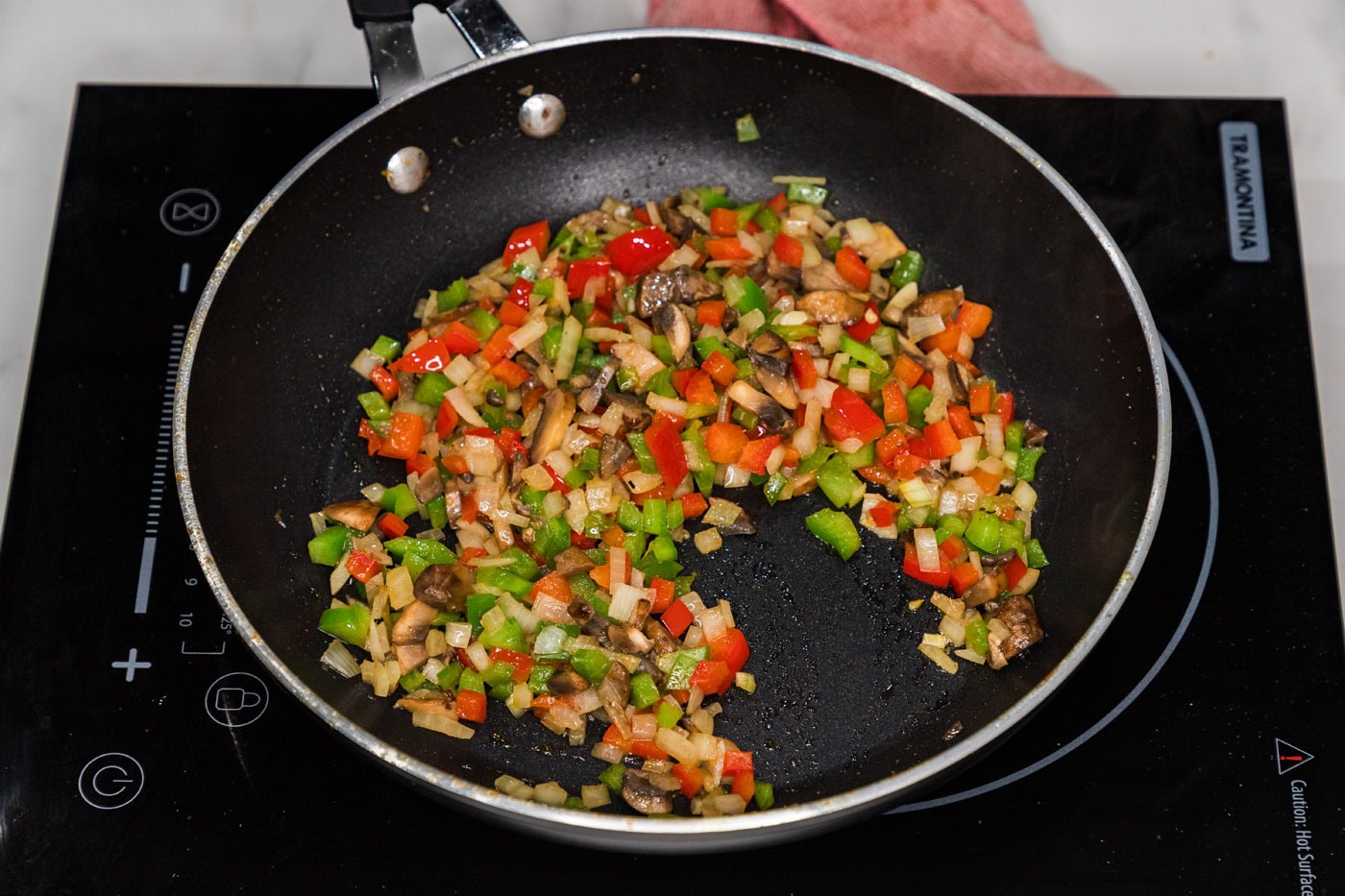 sauteed veggies in a skillet