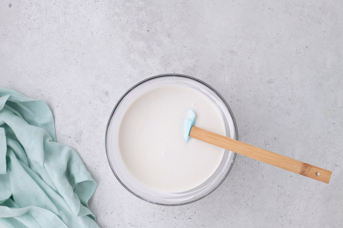coconut cream and sweetened condensed milk in a bowl