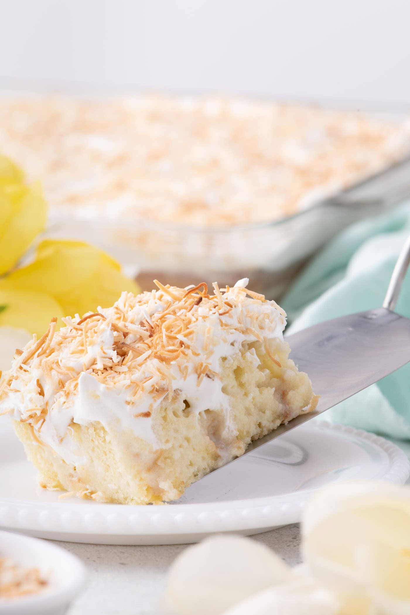 Coconut Poke Cake - Amanda's Cookin'
