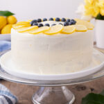 Lemon Poppy Seed Cake on a cake stand