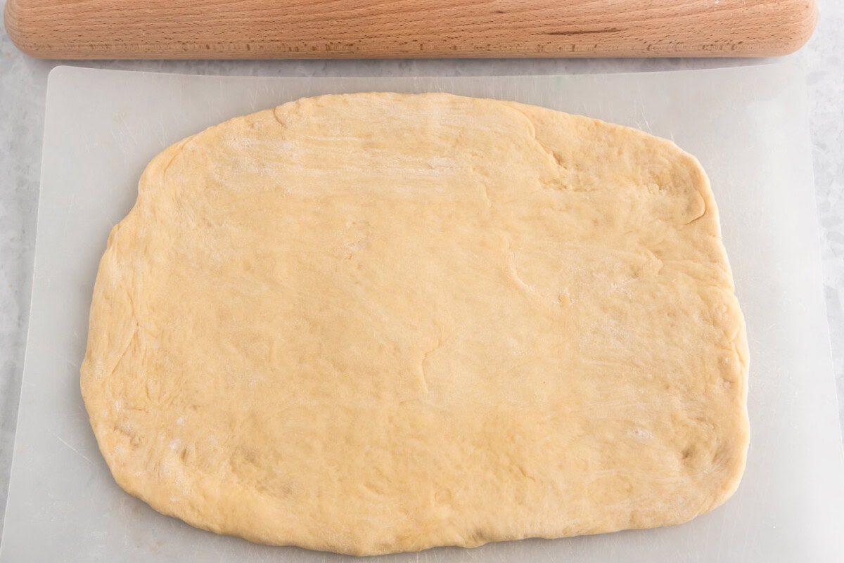 dough rolled out on flat surface