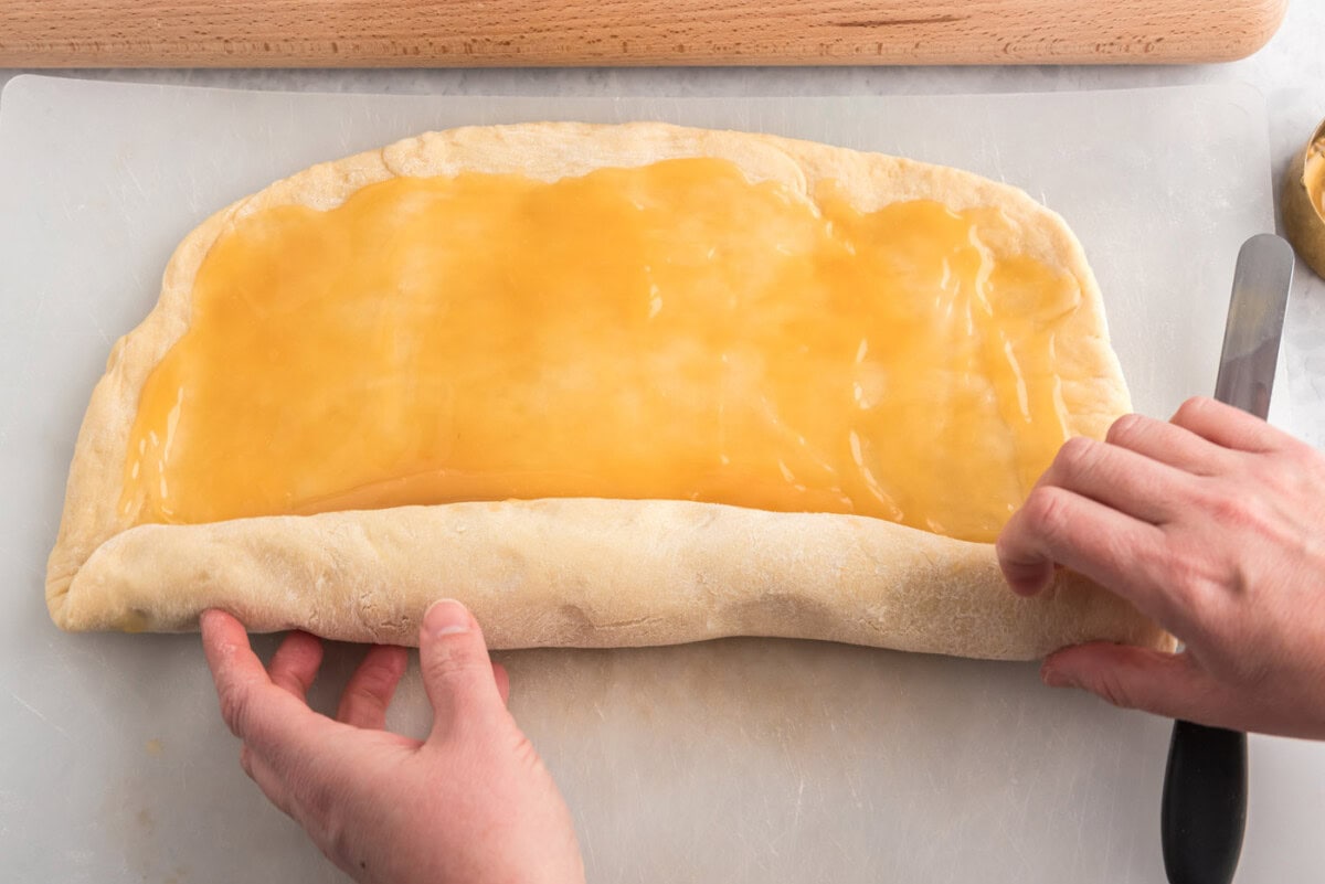 rolling lemon rolls into a log
