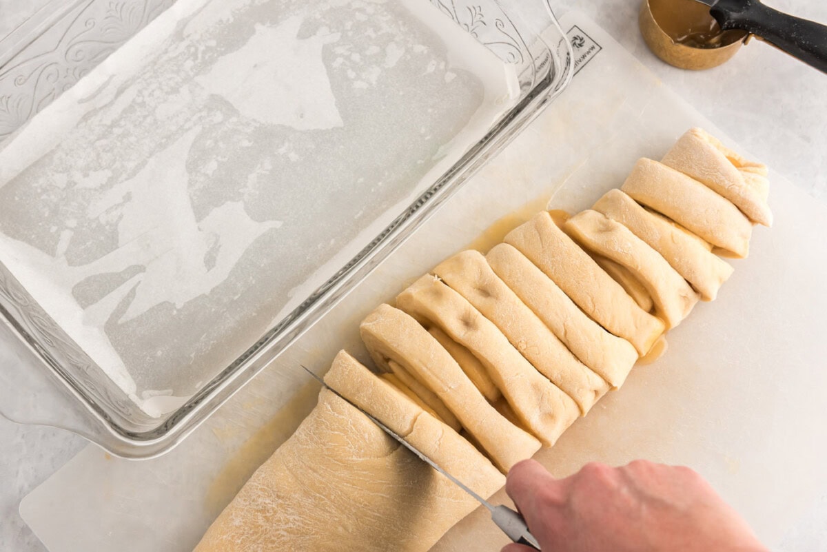 cutting dough logs into sections