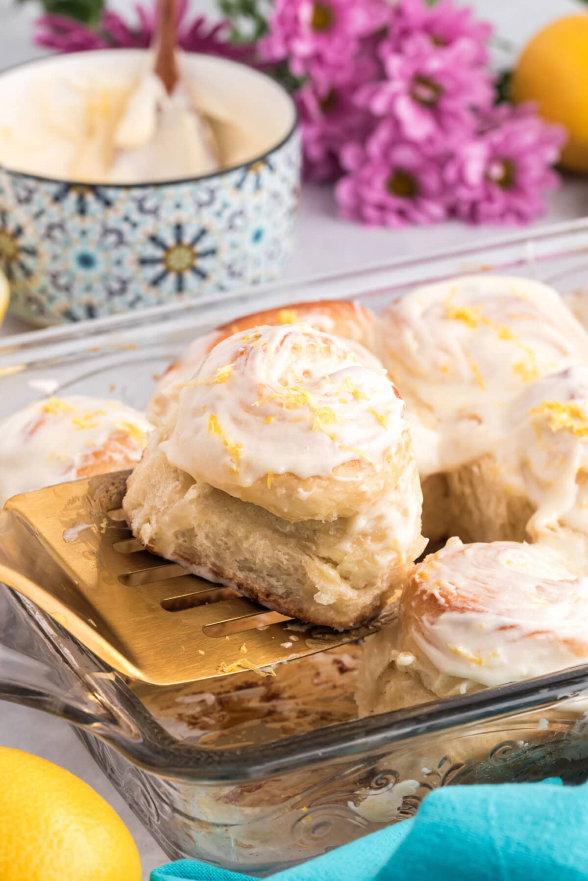Lemon Sweet Roll being lifted from the pan