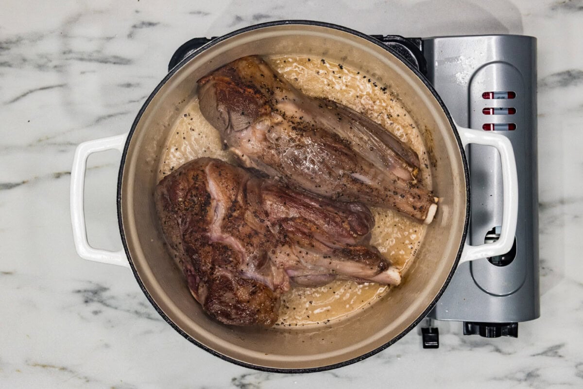 searing lamb shanks in a dutch oven with oil