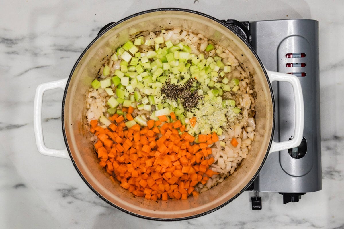 carrots, onions, and celery in a dutch oven
