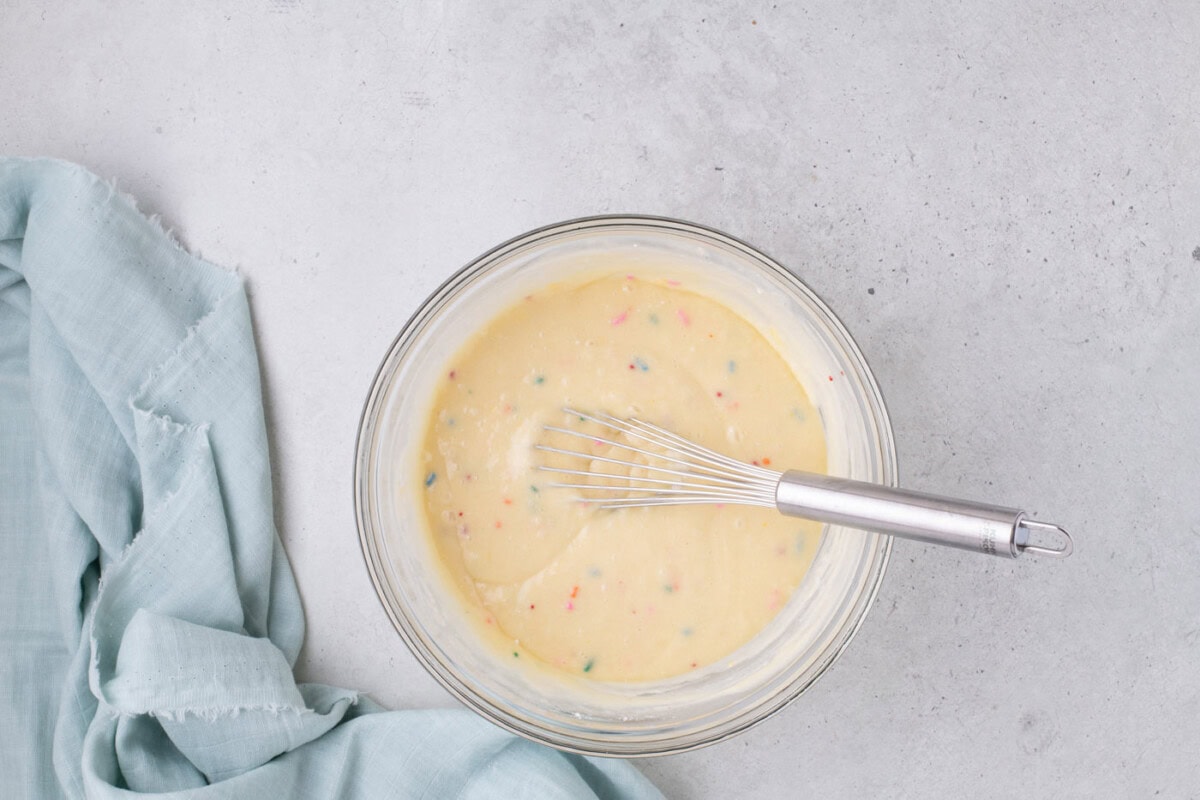 cake mix in a bowl with a whisk