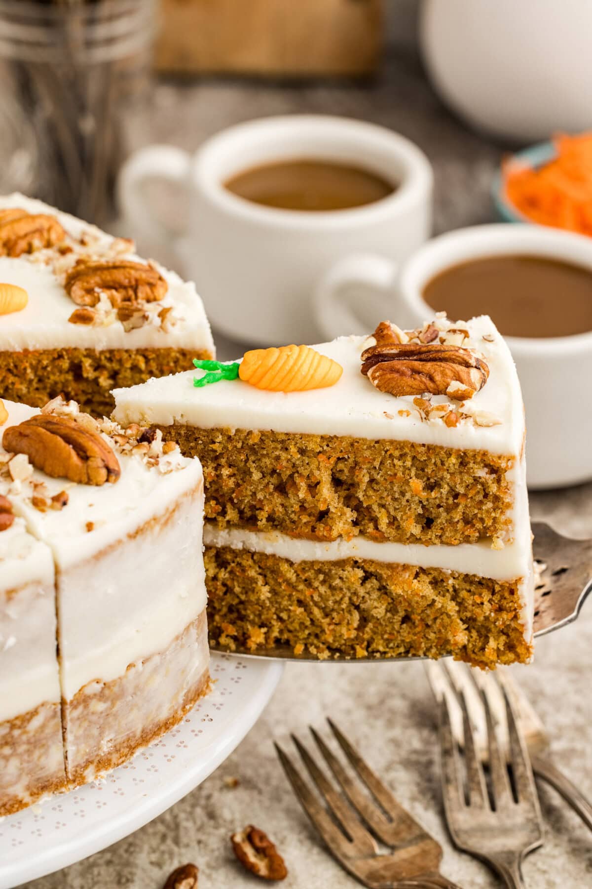 Slice of Carrot Cake being removed from the cake