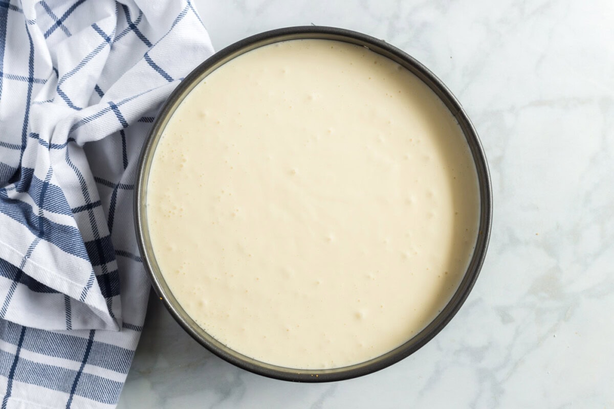 cheesecake mixture in pan
