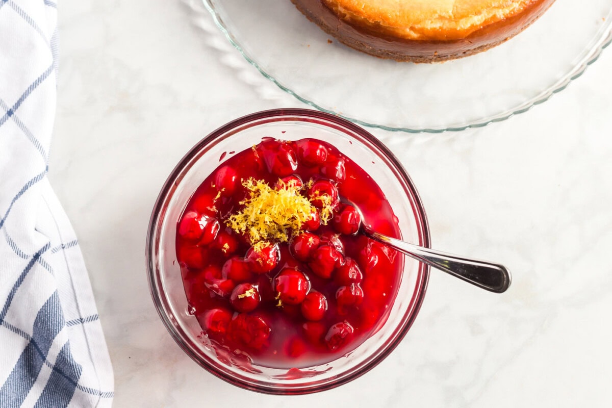 cherry pie filling and lemon rind in bowl