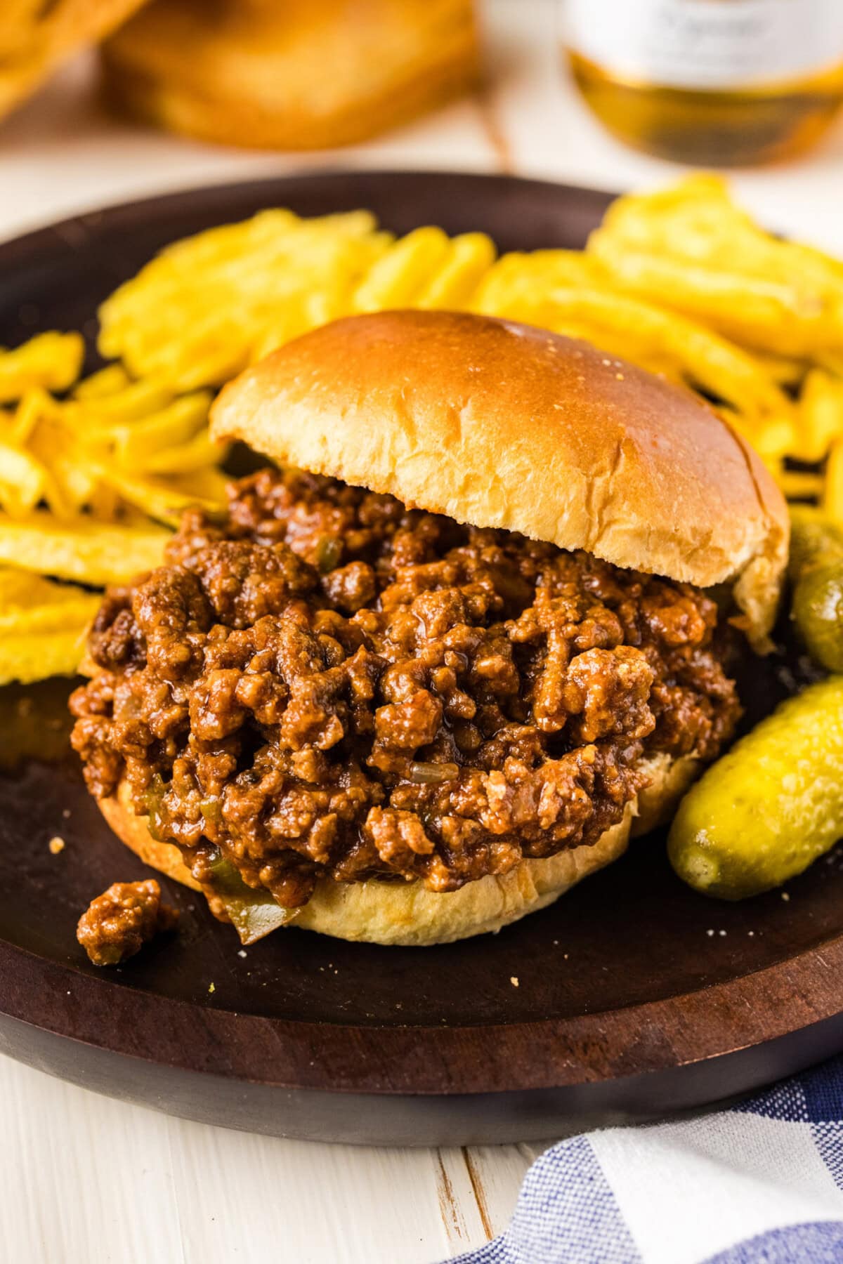 Bun sliding off a Crockpot Sloppy Joe sandwich 