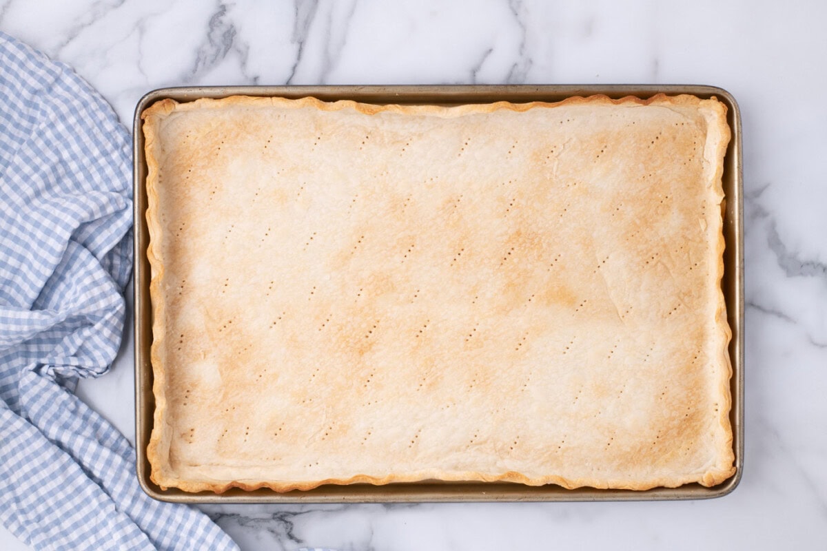 baked pie crust in a jelly roll pan